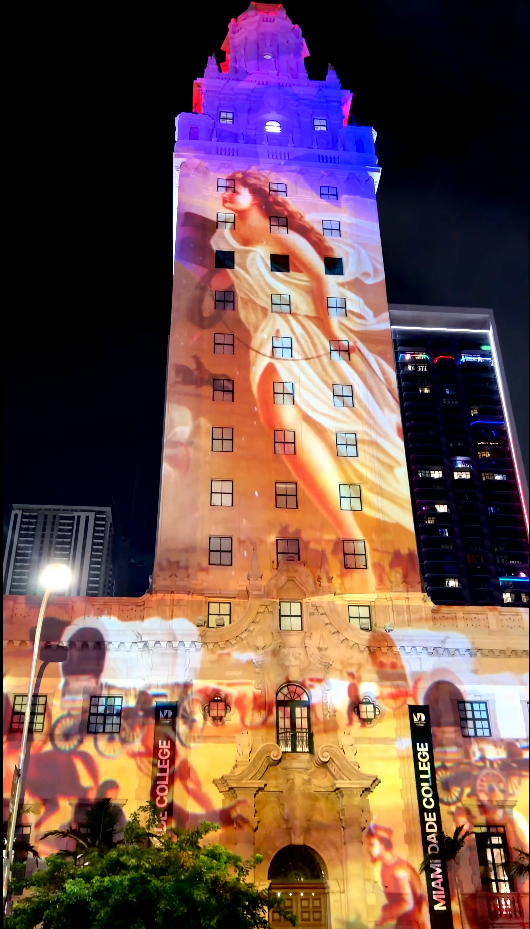 Historic portrait imagery projected at large scale on the Freedom Tower