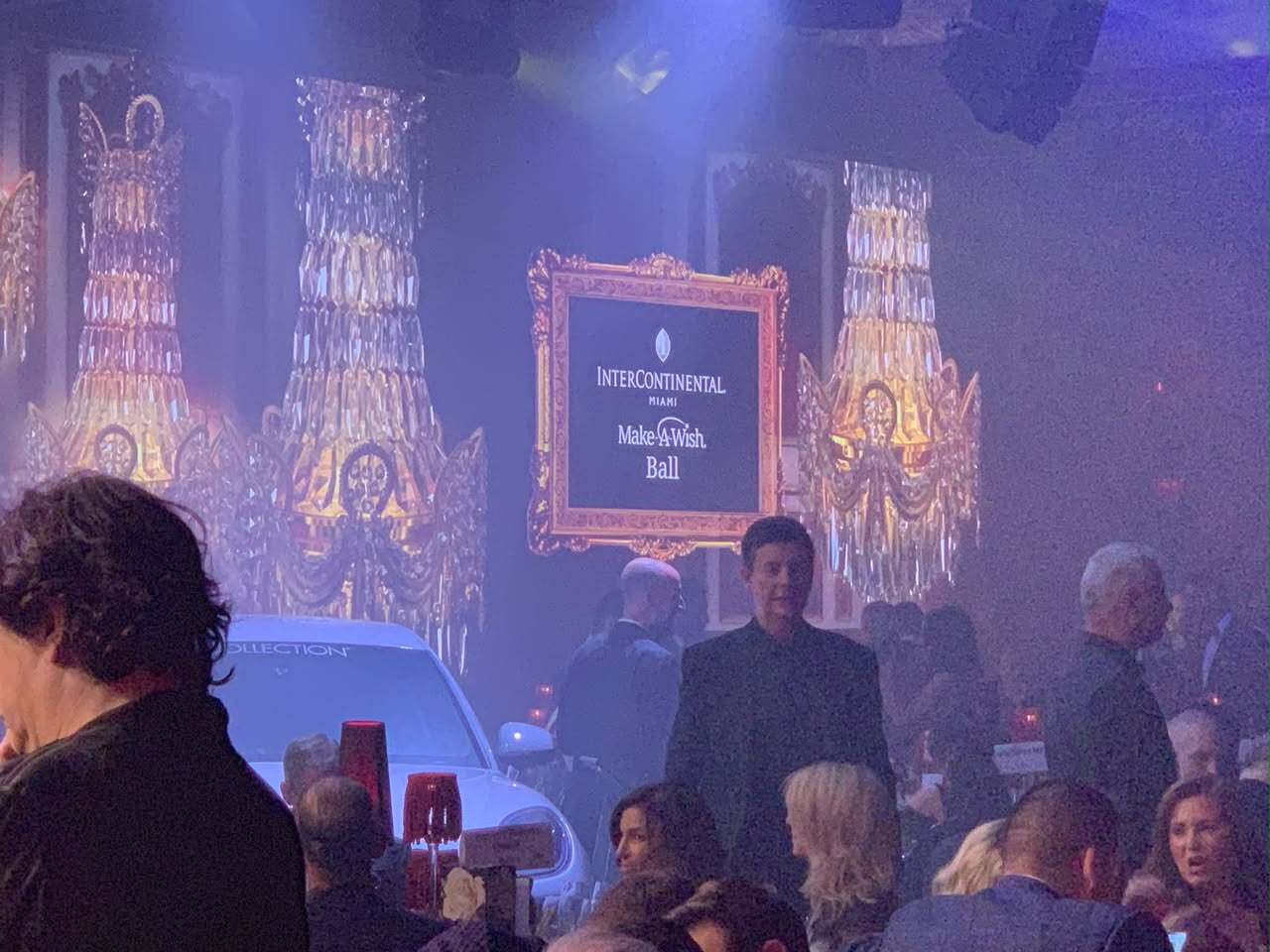 Make-A-Wish Ball guests surrounded by ornate digital scenery at InterContinental Miami
