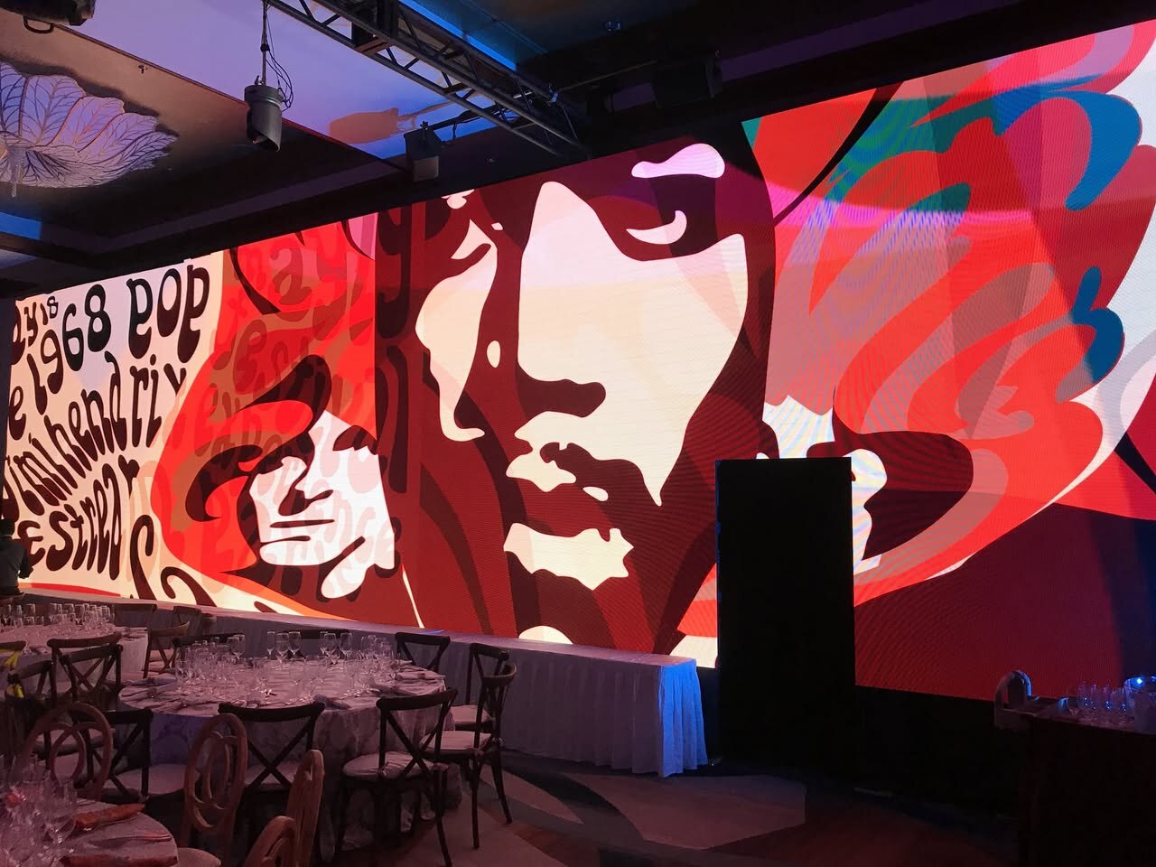 Close view of Summer of Love graphics across a wide LED wall
